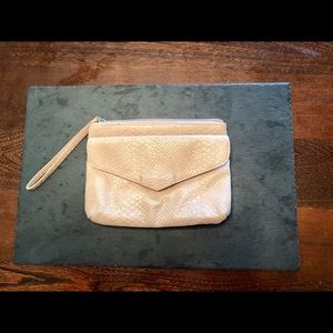 ➡️FREE WITH PURCHASE⬅️ Express Snake Print Clutch